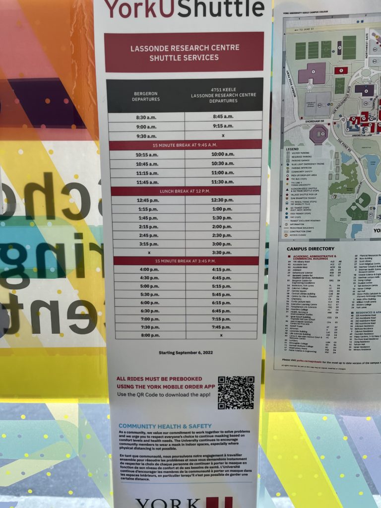 a photo of a shuttle bus schedule.  The content is provide in text format immediately below